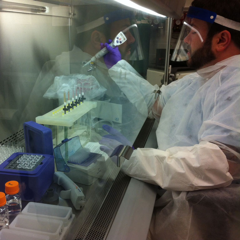 A man working in a lab space